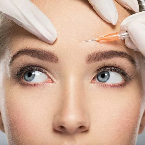 Séance d'injection en médecine esthétique à la Clinique Churchill, Uccle